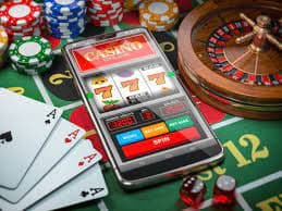 NetEnt live blackjack studio interface showing dealer and card table